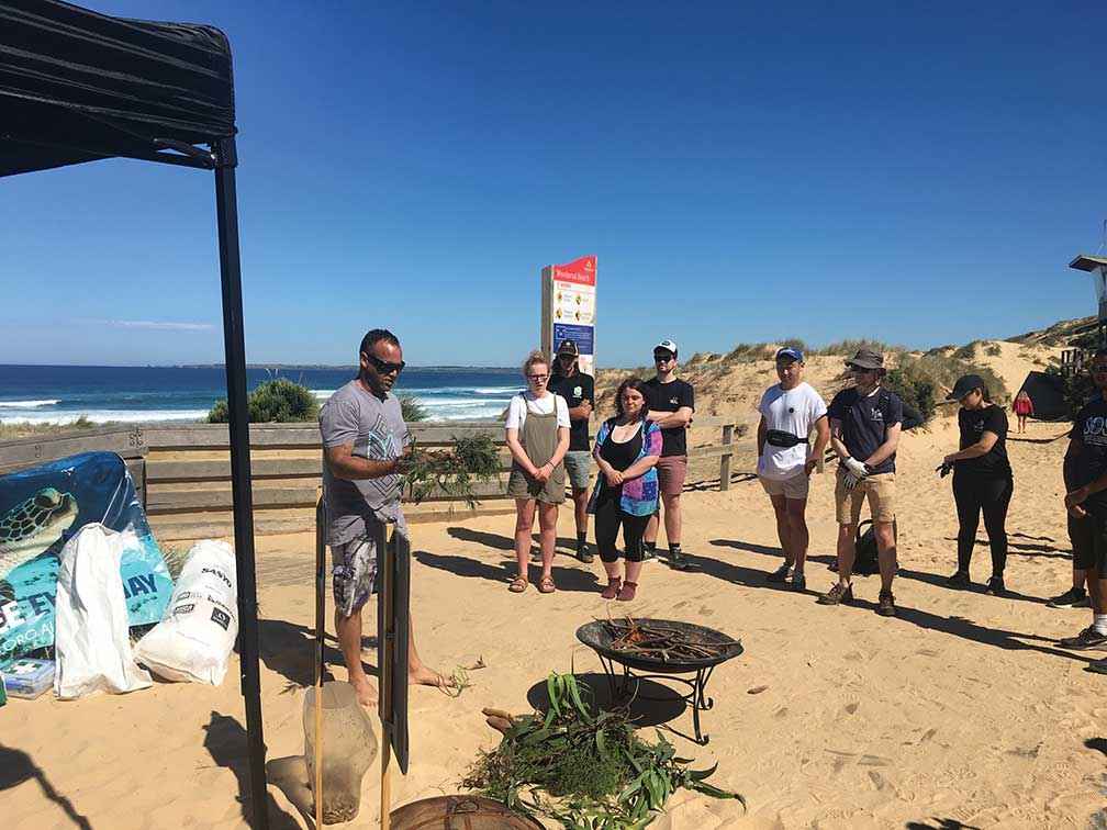 Boonwurrung man Steve Ulula Parker conducts a Welcome to Country before a clean-up at Woolamai Beach.