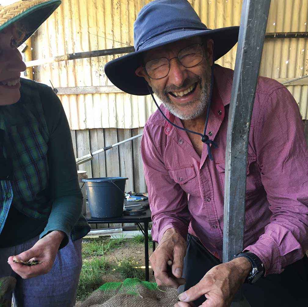 Coastcare volunteer Leo Lubransky worked quickly to get seed sown into sandbags <br />
before it dried out and died.<br />
