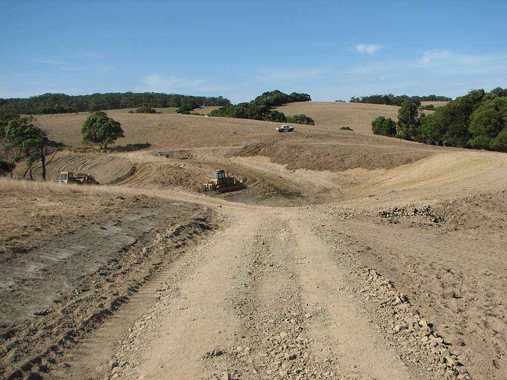 Building the dam at Amber Creek Farm during the 2008 drought.  