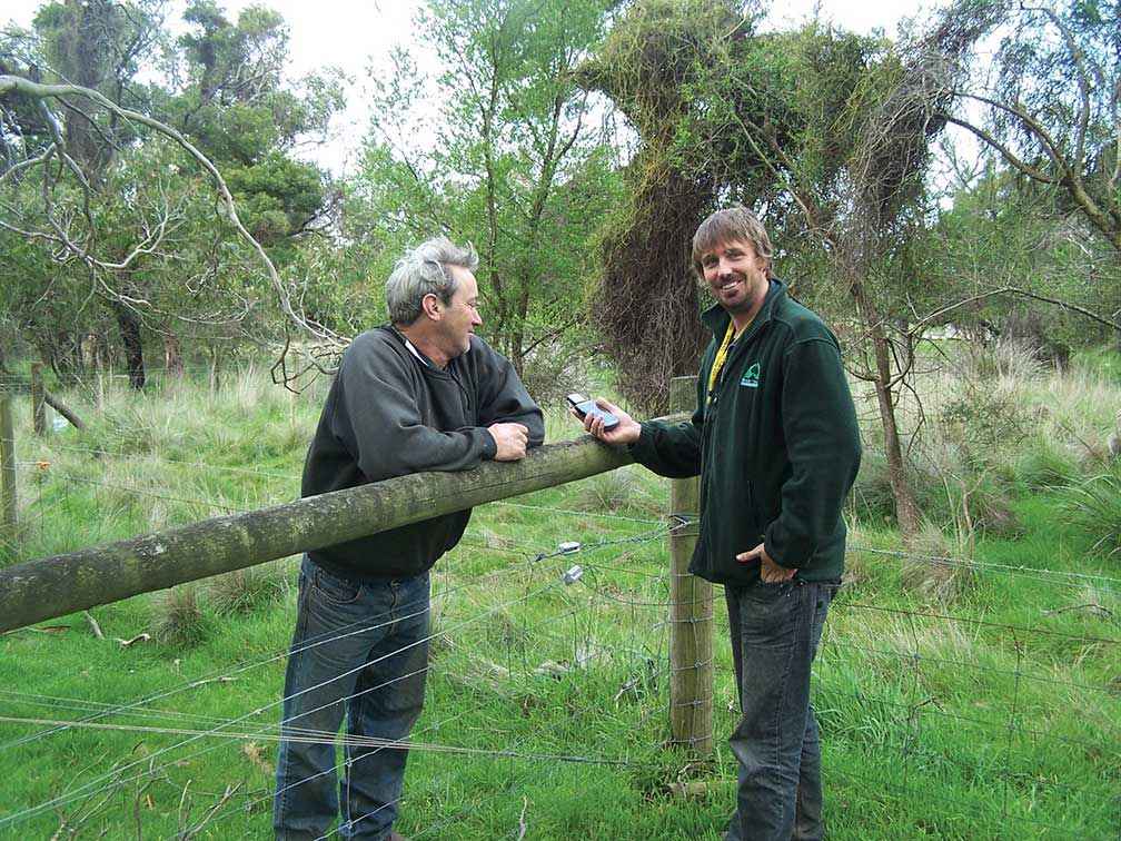 Dave Bateman (at right) talking revegetation with Bill Cleeland on his farm at Phillip Island.