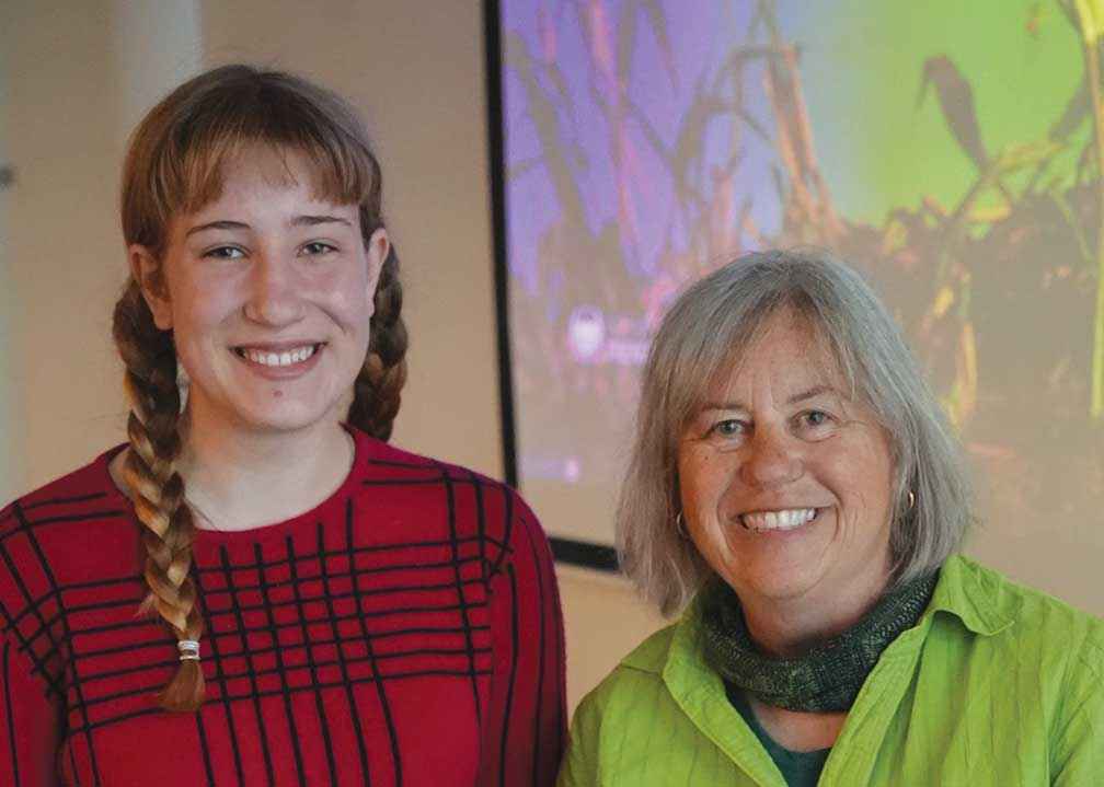 Sophie Hart (left) accepts her award from Carol Challis from VEFN.
