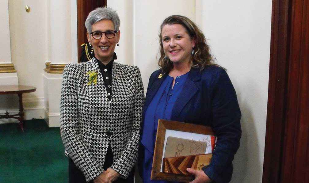 The Honourable Linda Dessau AM, Governor of Victoria (left), congratulates Lisette Mill on her 2015 VFF/FTLA Heather Mitchell Memorial Fellowship.